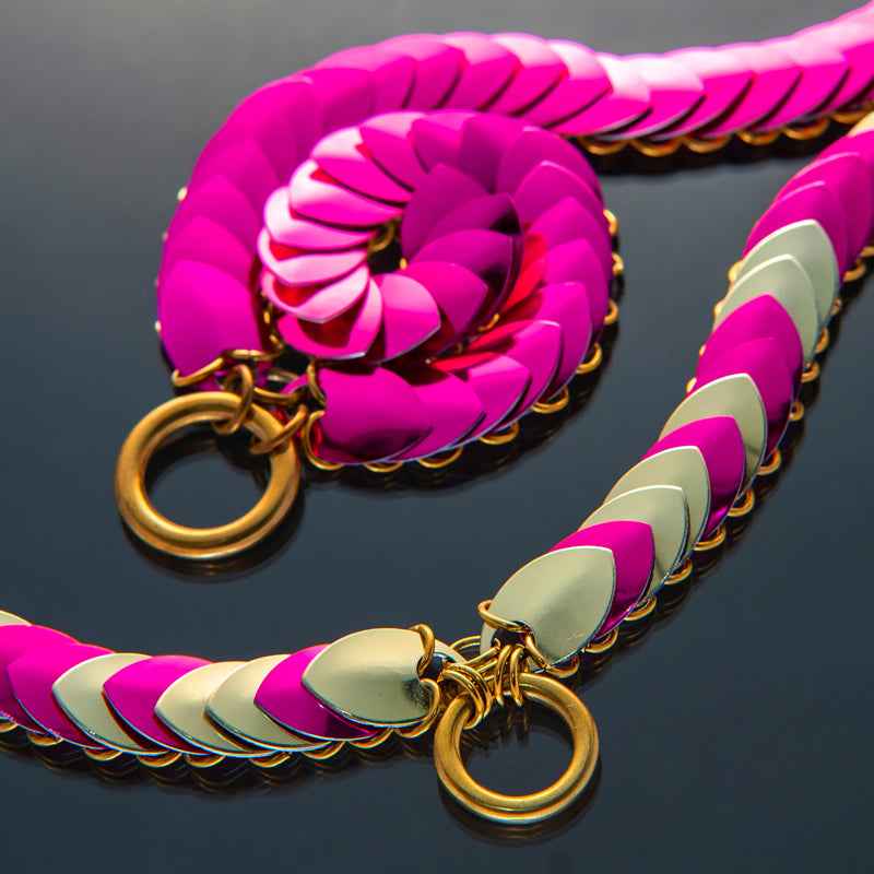 Chain necklace with pink and gold scales, stylish and modern, evoking bold and vibrant emotions