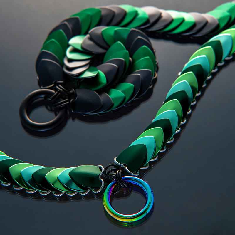 chain necklace in green and black scales with rainbow ring clasp, sleek modern style, vibrant and bold