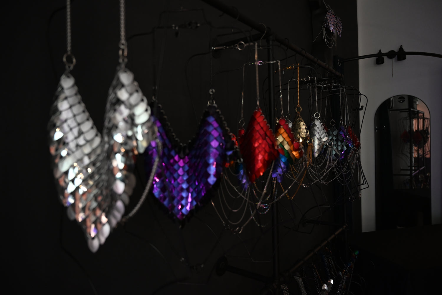 Lisa Majuns scale design on hanger at her showroom 